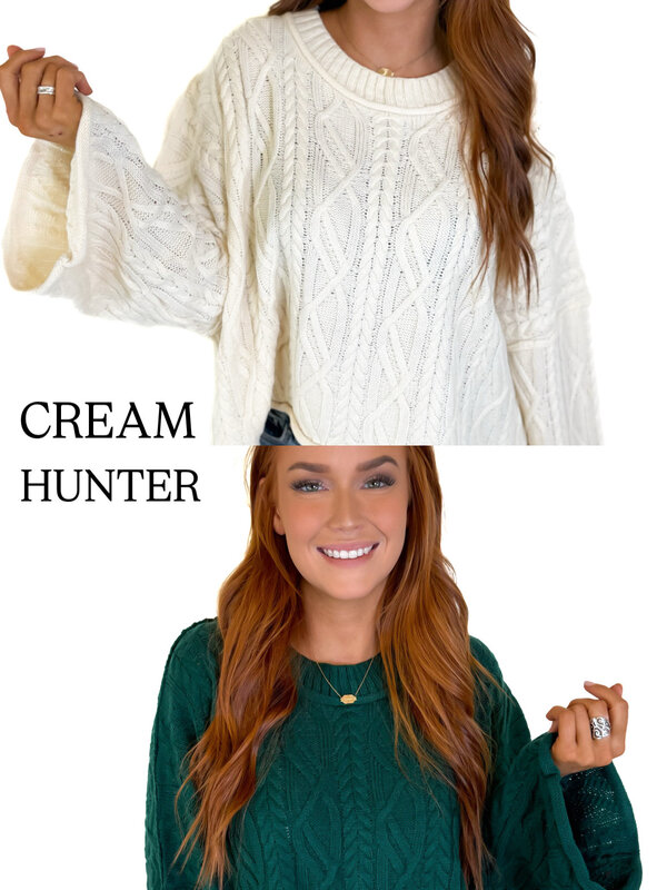 OVERSIZED CABLE KNIT SWEATER