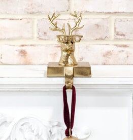 Gold eyeglass reindeer stocking holder