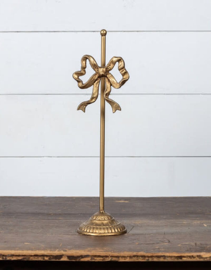 GOLD WREATH STAND W/ BOW