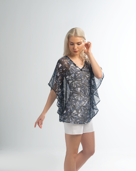 Simply Noelle Abstract Circle Curved Hemline Top By: Simply Noelle