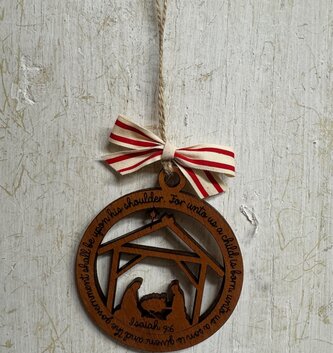 Wooden Isaiah A Child Is Born Manger Ornament