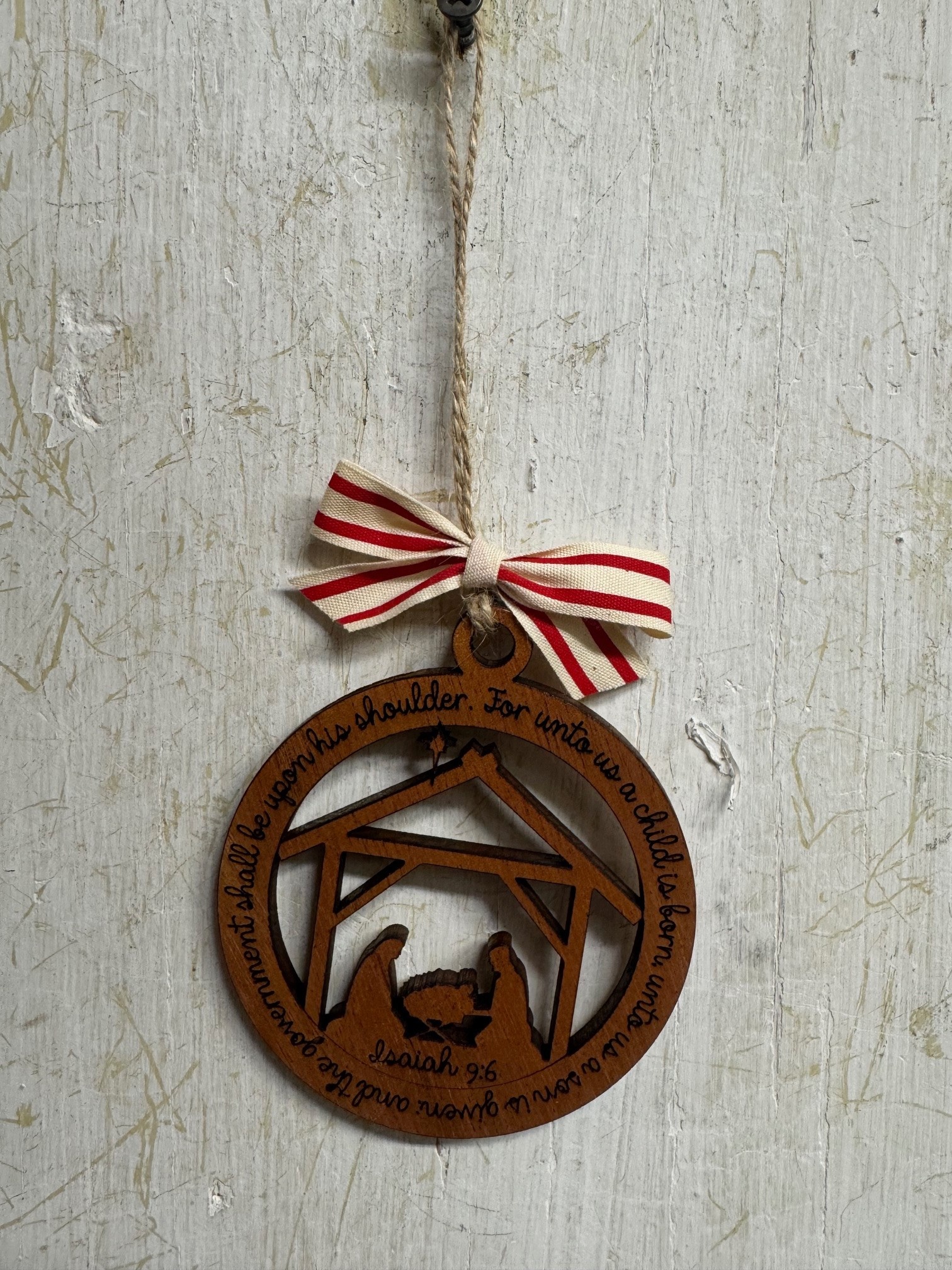 Wooden Isaiah A Child Is Born Manger Ornament