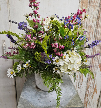 Custom Forget Me Not Wildflower Arrangement in Daisy Container