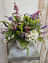 Custom Forget Me Not Wildflower Arrangement in Daisy Container