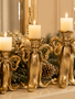 Set of 3 Golden Bow Candlesticks