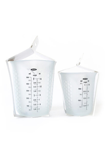 https://cdn.shoplightspeed.com/shops/617522/files/55744706/410x610x1/oxo-oxo-squeeze-and-pour-silicone-measuring-cup.jpg