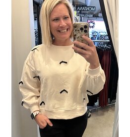 Cream sweatshirt w/ black satin ribbons