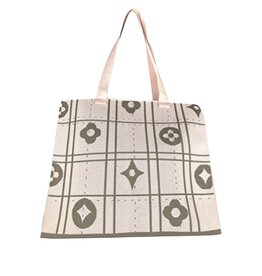 JOIA Pale pink knit ‘look for less’ tote