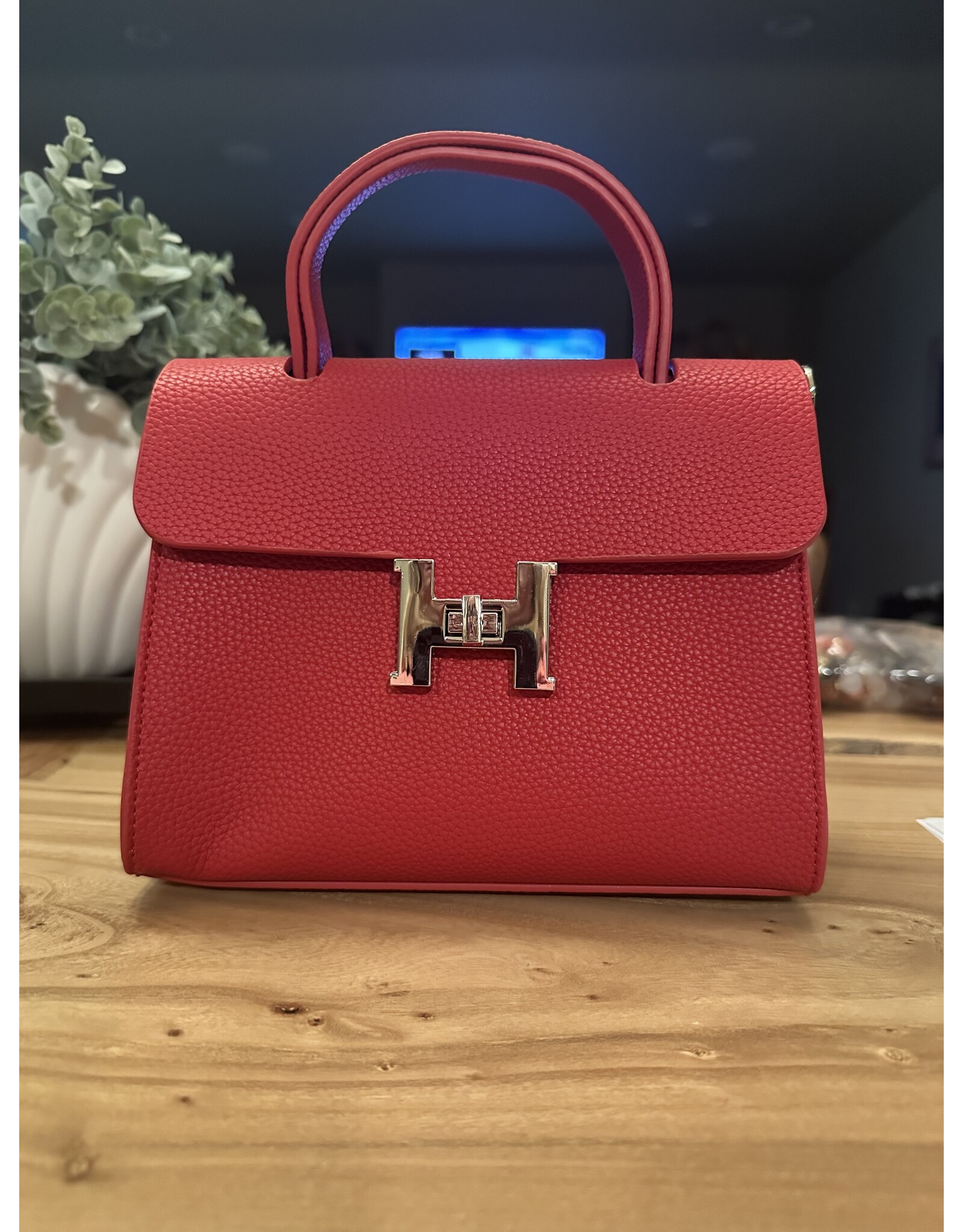 JOIA ‘H’ Red handbag