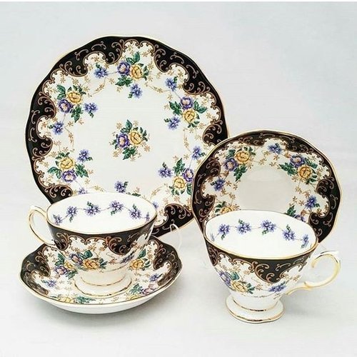 Royal Albert 100th Year Teacup, Saucer and Plate Set Royal Albert 100th Year Teacup, Saucer and Plate Set