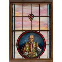 Priest Stained Glass Window