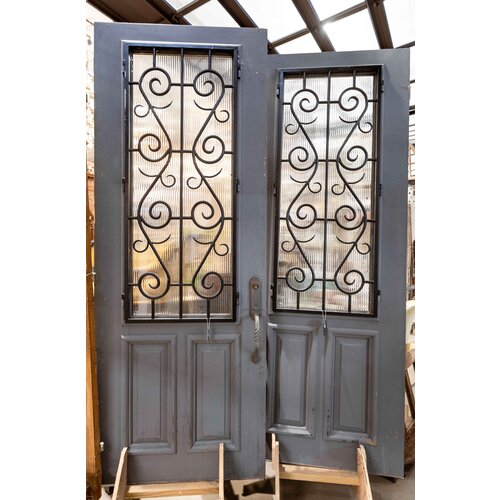 Iron Scrollwork Door with Reeded Glass