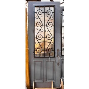 Iron Scrollwork Door with Reeded Glass Iron Scrollwork Door with Reeded Glass
