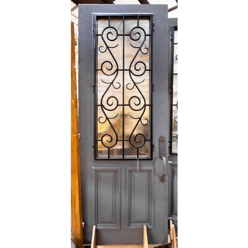 Iron Scrollwork Door with Reeded Glass Iron Scrollwork Door with Reeded Glass