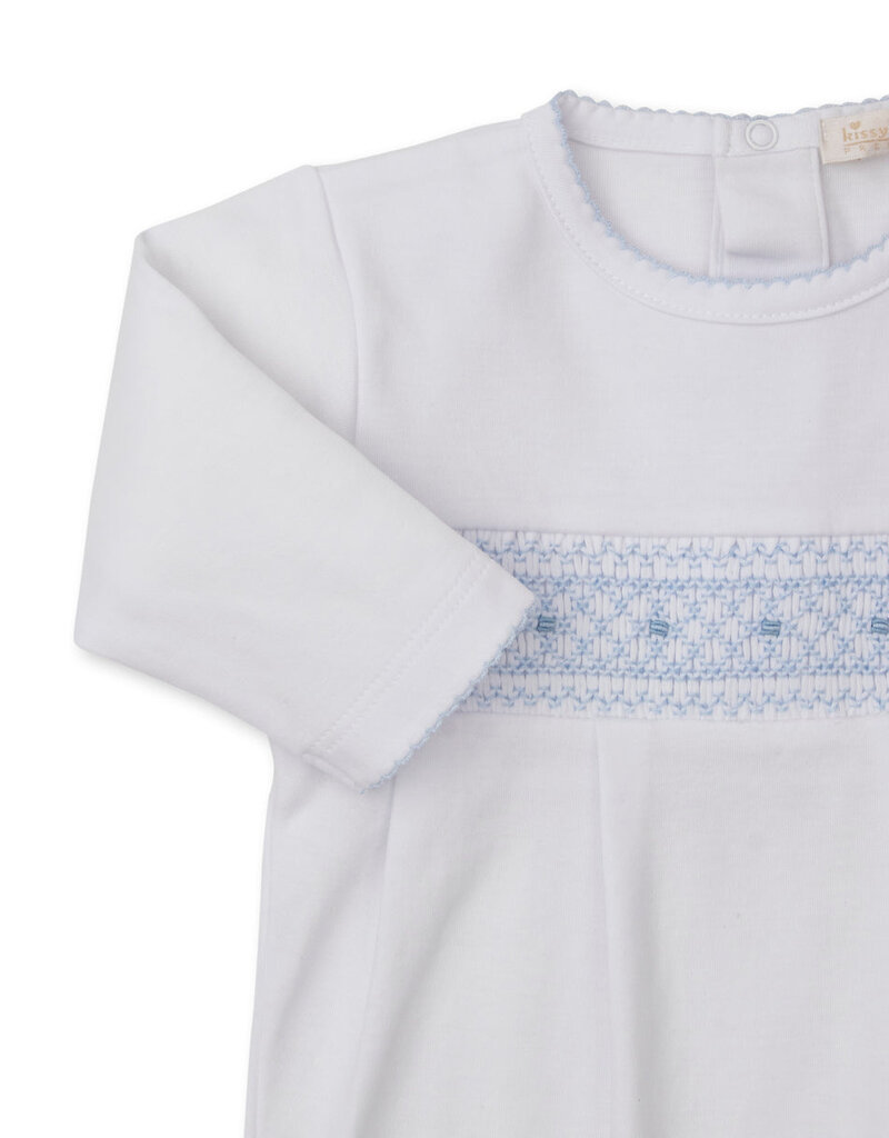 Kissy Kissy white footie w/blue hand smocking