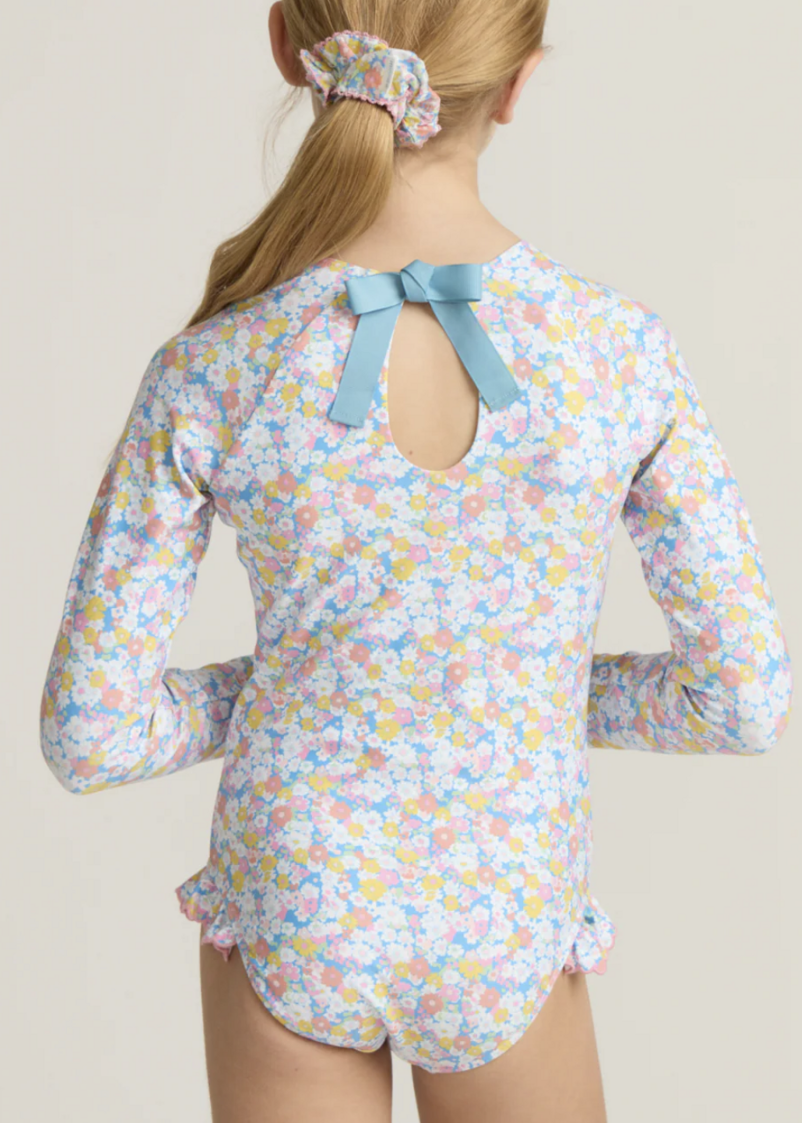 Minnow jasmine blossom rashguard one piece