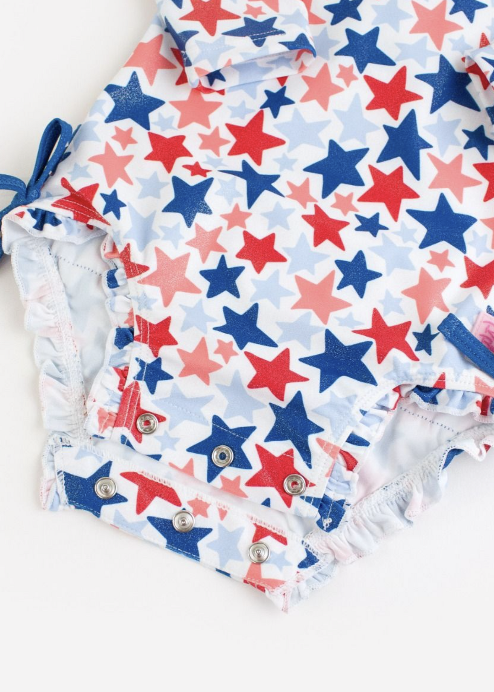RuffleButts Shimmer Star-Spangled L/S 1 Piece Rashguard w/Ruffles