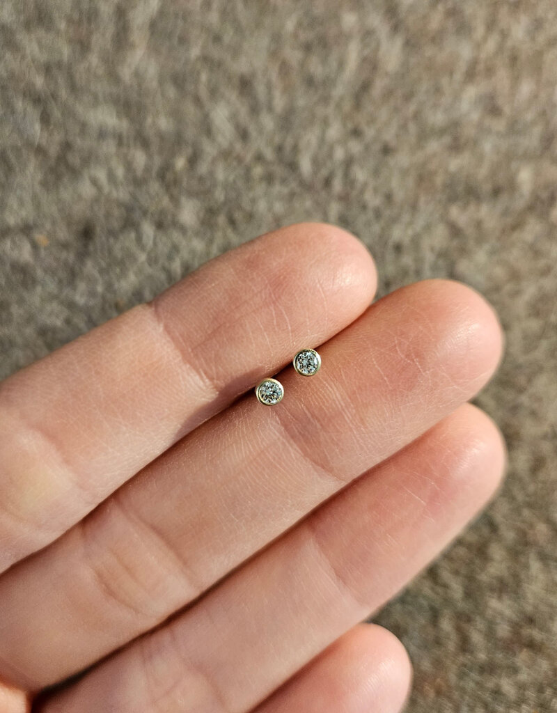 Tiny Diamond Post Earrings in 14k Gold