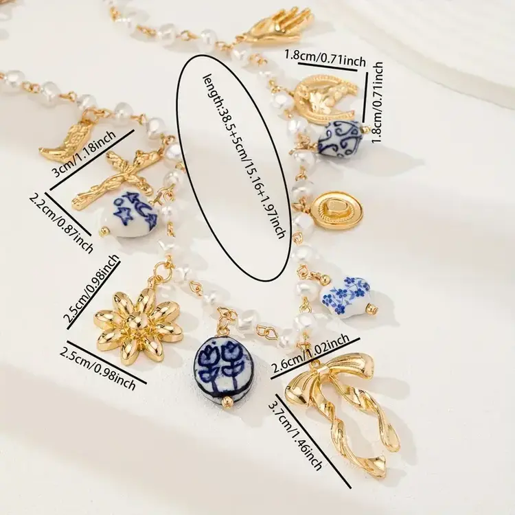 Handmade Ceramic Pendant Necklace with Blue Floral Cross, White Star & Golden Bow Charms