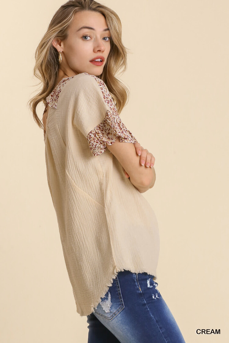 Umgee Gauze Animal Print Ruffle Sleeves Top with Fringe Hem and Cut Out Back