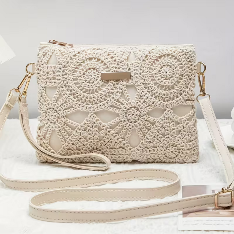 Elegant Crossbody Bag Featuring Intricate White Patterns and Paired with a Easy Nude Strap