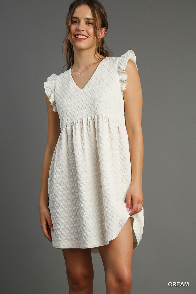 Umgee Textured Jacquard Babydoll Dress with V-neck and Ruffle Cap Sleeves Cream S