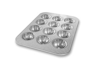 https://cdn.shoplightspeed.com/shops/617932/files/38773986/300x250x2/usa-pan-mini-fluted-cupcake-pan-usa.jpg