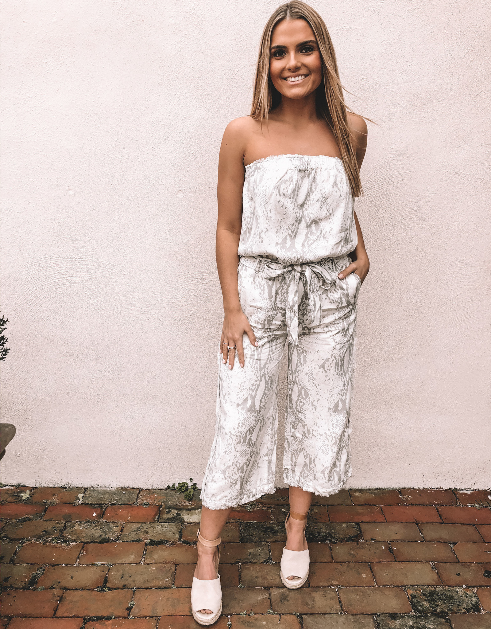 white snakeskin jumpsuit