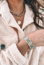 Gucci and Louis Vuitton strap bracelets
