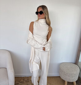 Kristin Sleeveless Turtle Neck Knit Top