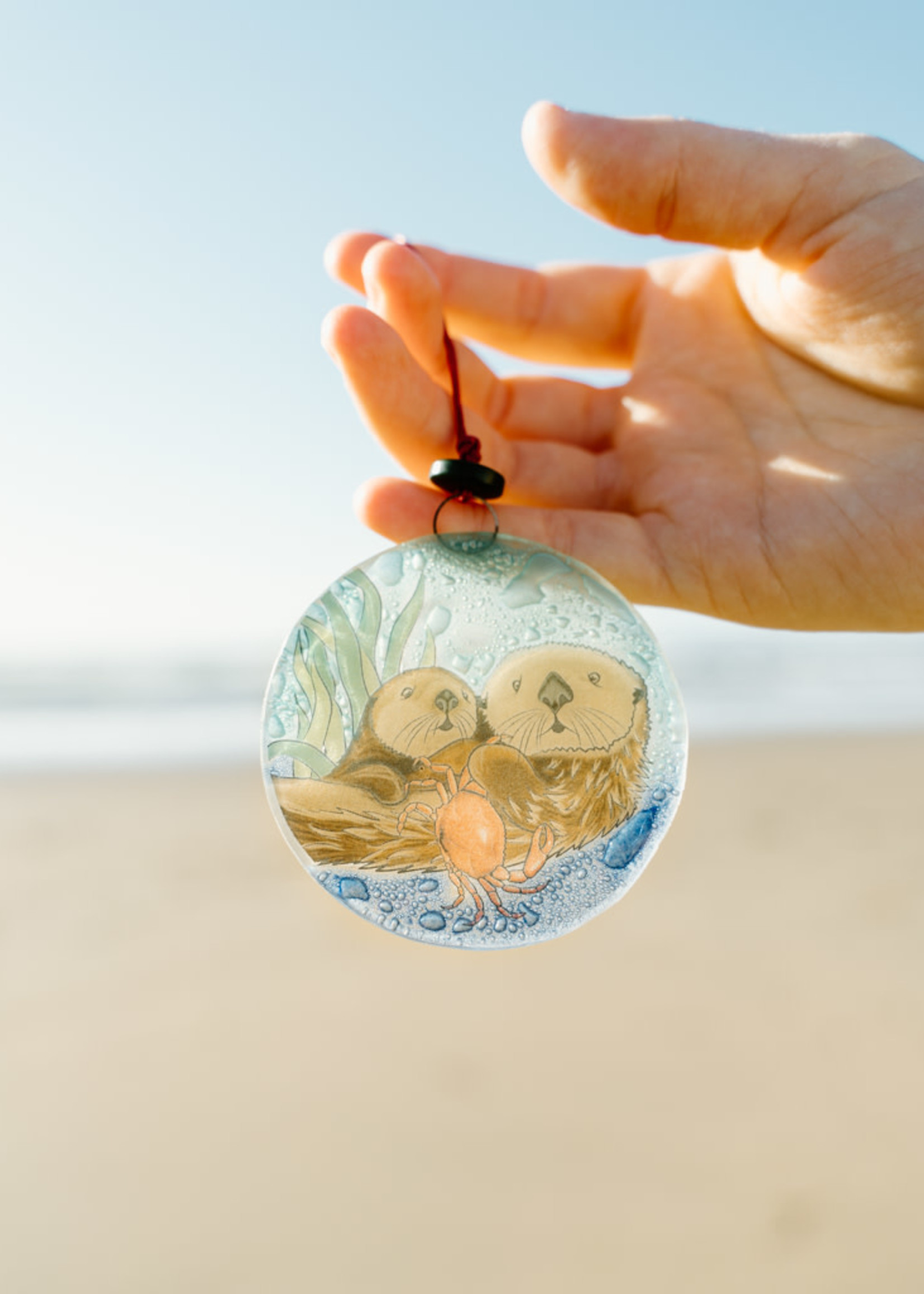Pampeana Otter with Crab Glass Ornament
