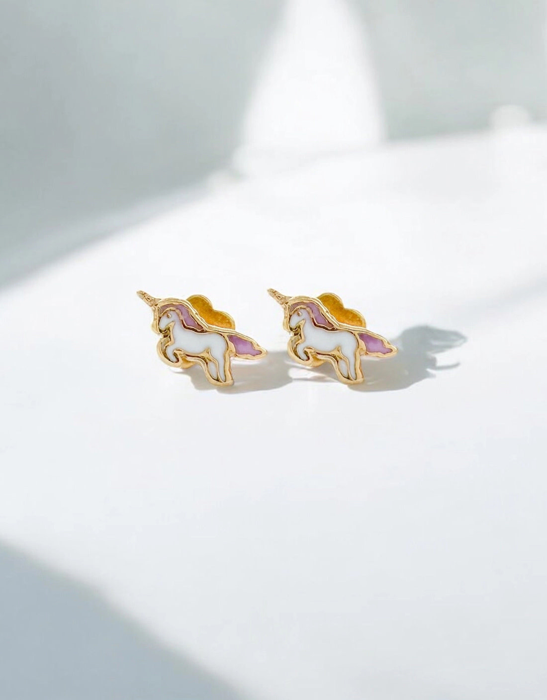 Tiny Unicorn Stud Earrings from HumanKind Fair Trade HumanKind Fair Trade