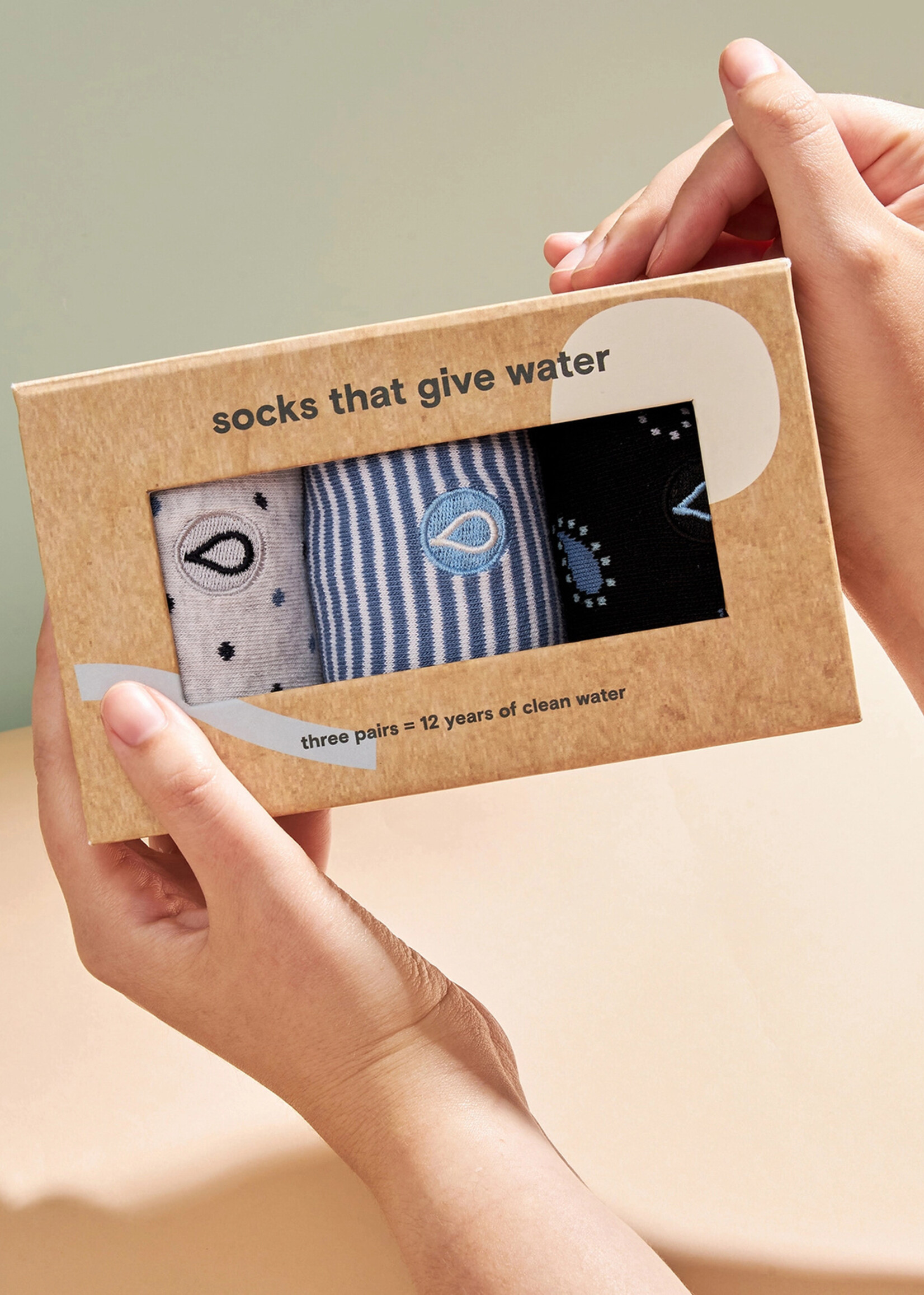 Conscious Step Men's Sock Box that Gives Water