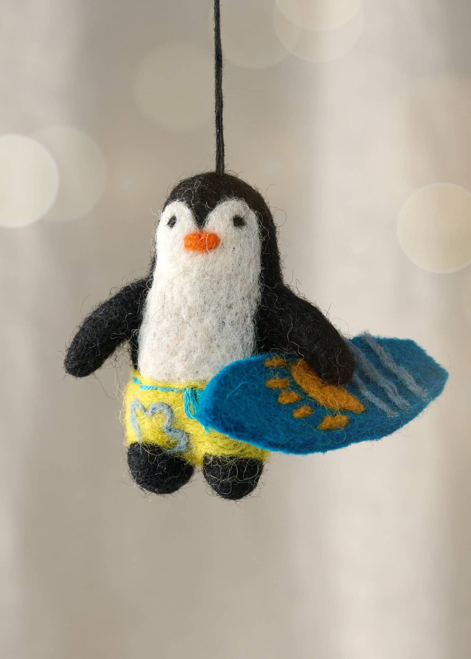 Ten Thousand Villages Felt Surfing Penguin Ornament