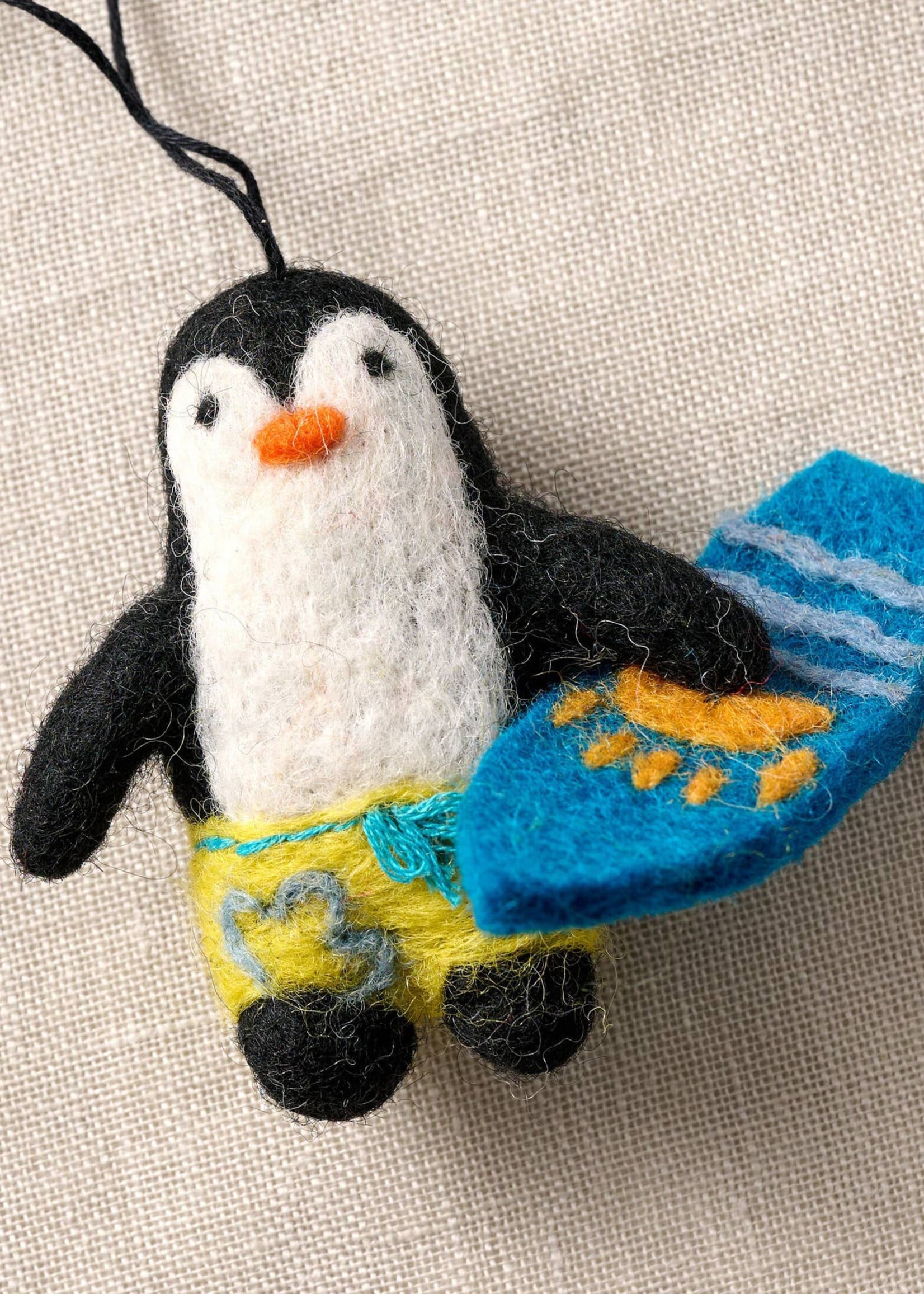 Ten Thousand Villages Felt Surfing Penguin Ornament