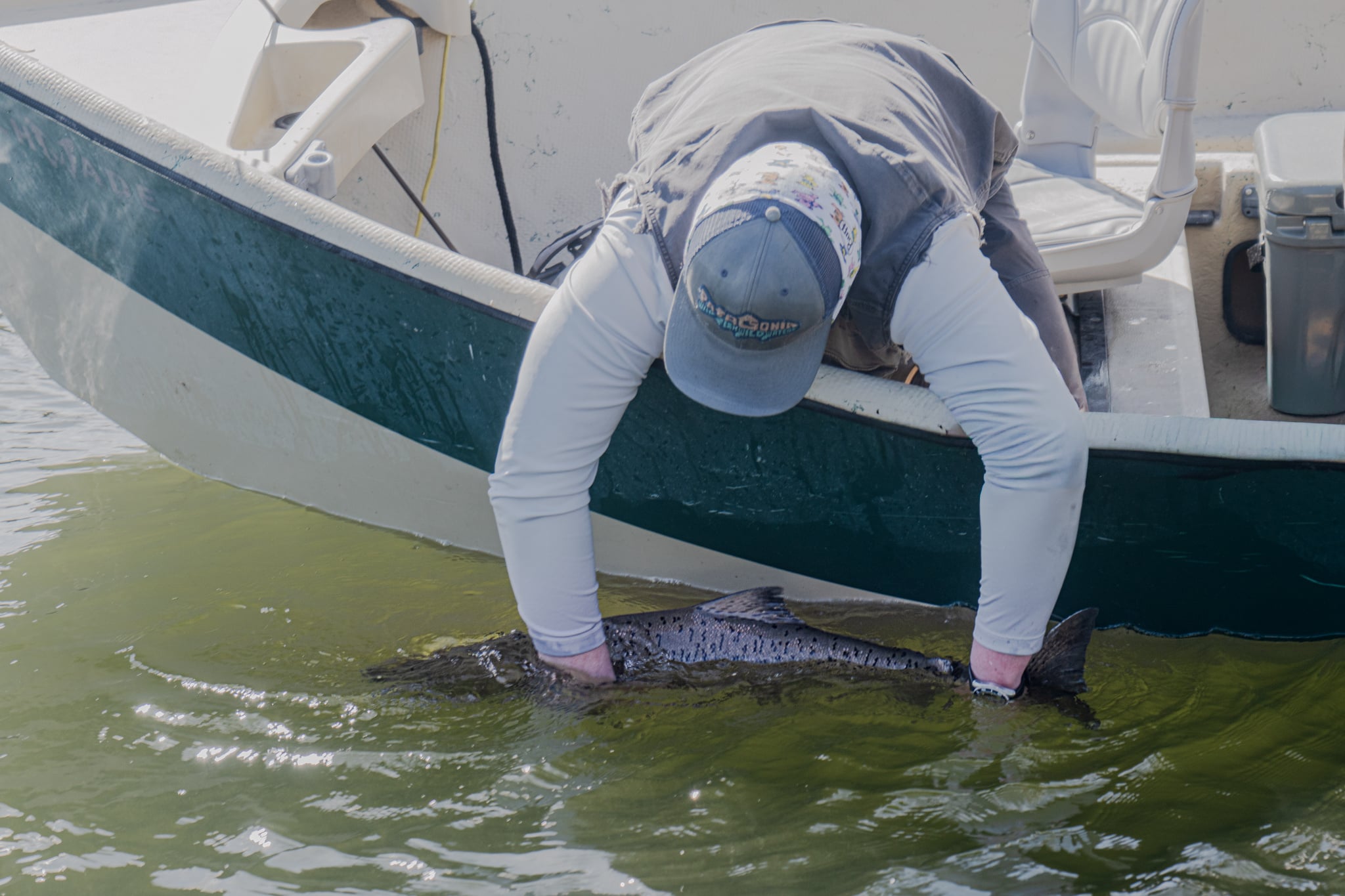 Alex and a tidewater Chinook on a recent trip to the coast.