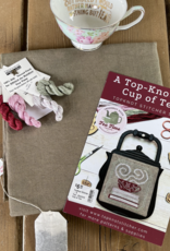 TopKnot Stitcher - A Top-Knot (ch) Cup of Tea