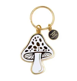 https://cdn.shoplightspeed.com/shops/618697/files/55452449/262x276x1/these-are-things-keychain-enamel-white-and-gold-mu.jpg