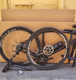Service: Pack bike into box or travel case