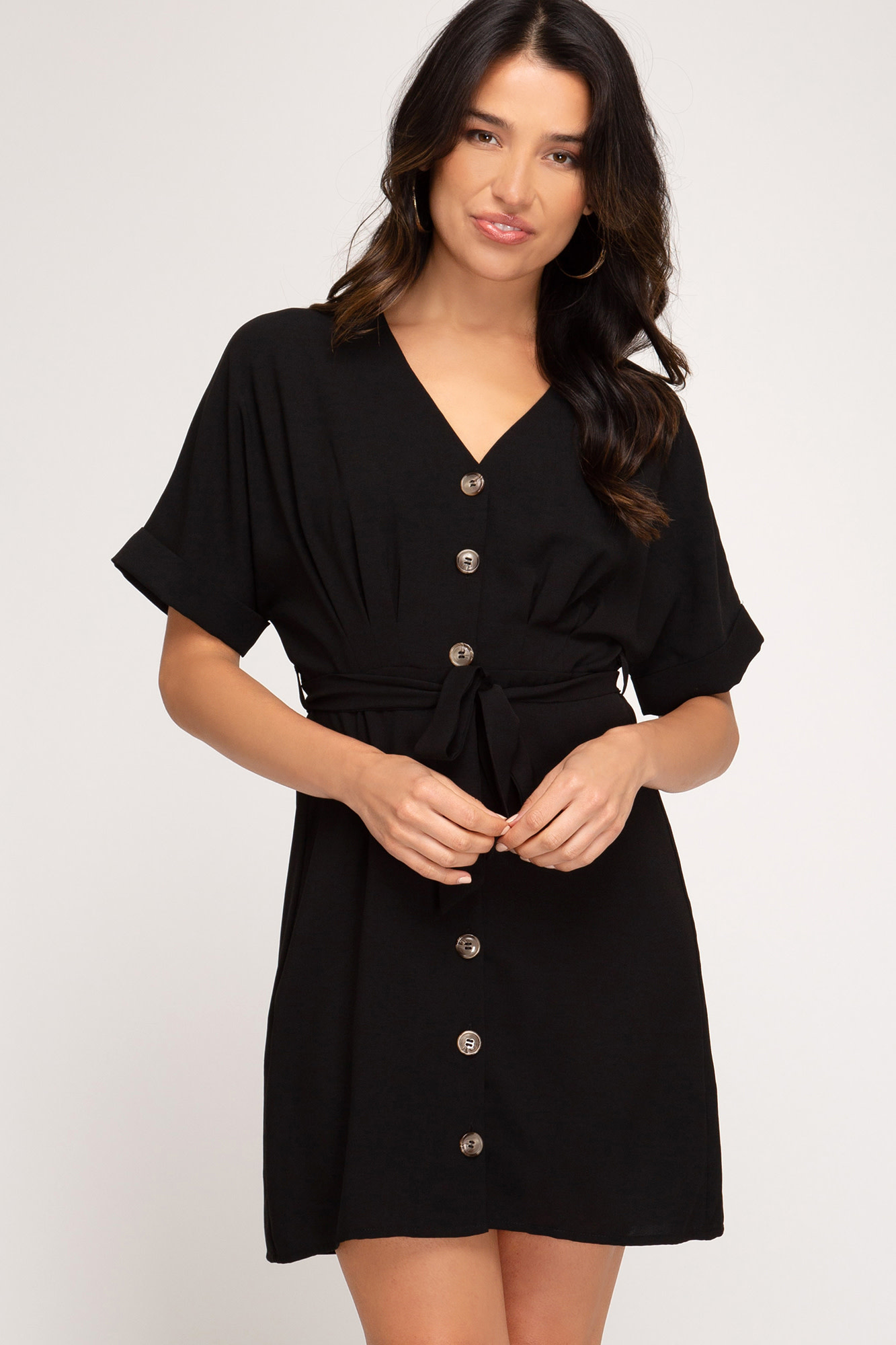 black dress with buttons in the front