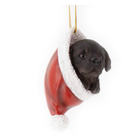 Labrador dans une tuque de Noël
