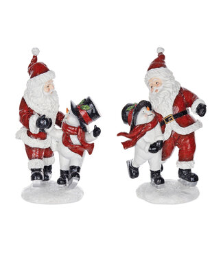 Père-Noël et bonhomme de neige sur patins