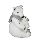 Maman ours polaire avec bébé dans les bras