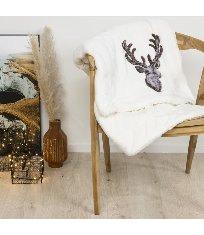 Couverture blanche-crème avec tête de renne