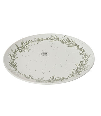 Assiette blanche branche et baies