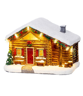 Maison en bois rond illuminée Maison en bois rond illuminée