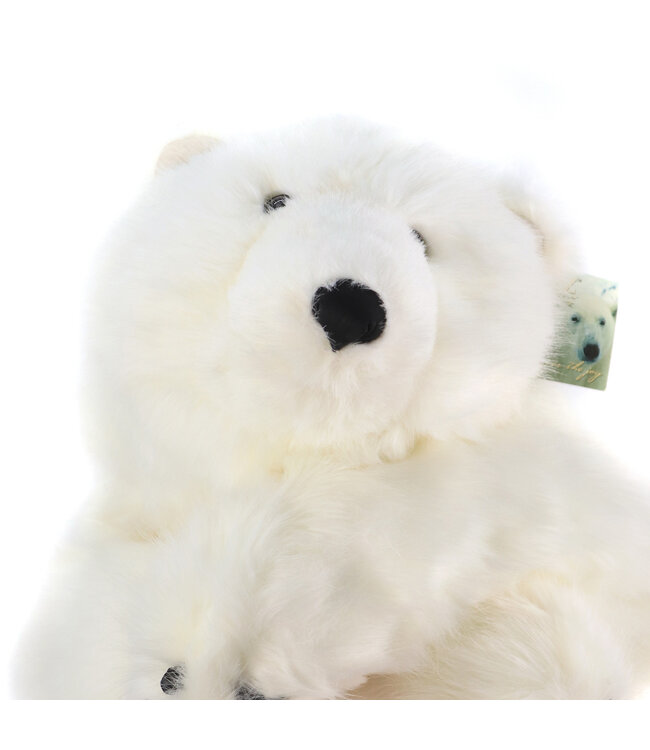 Ours blanc câlin – Douceur et magie au cœur des fêtes