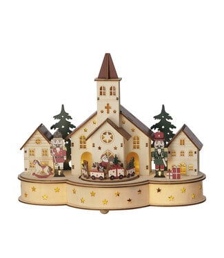 Village de Noël avec église et casse-noisettes