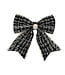 Boucle de Noël noire chic sur pince