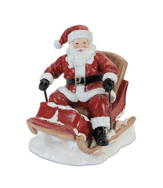 Père-Noël assis sur traîneau
